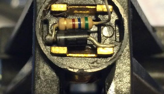 closer view of diode and resistor in doorbell button base